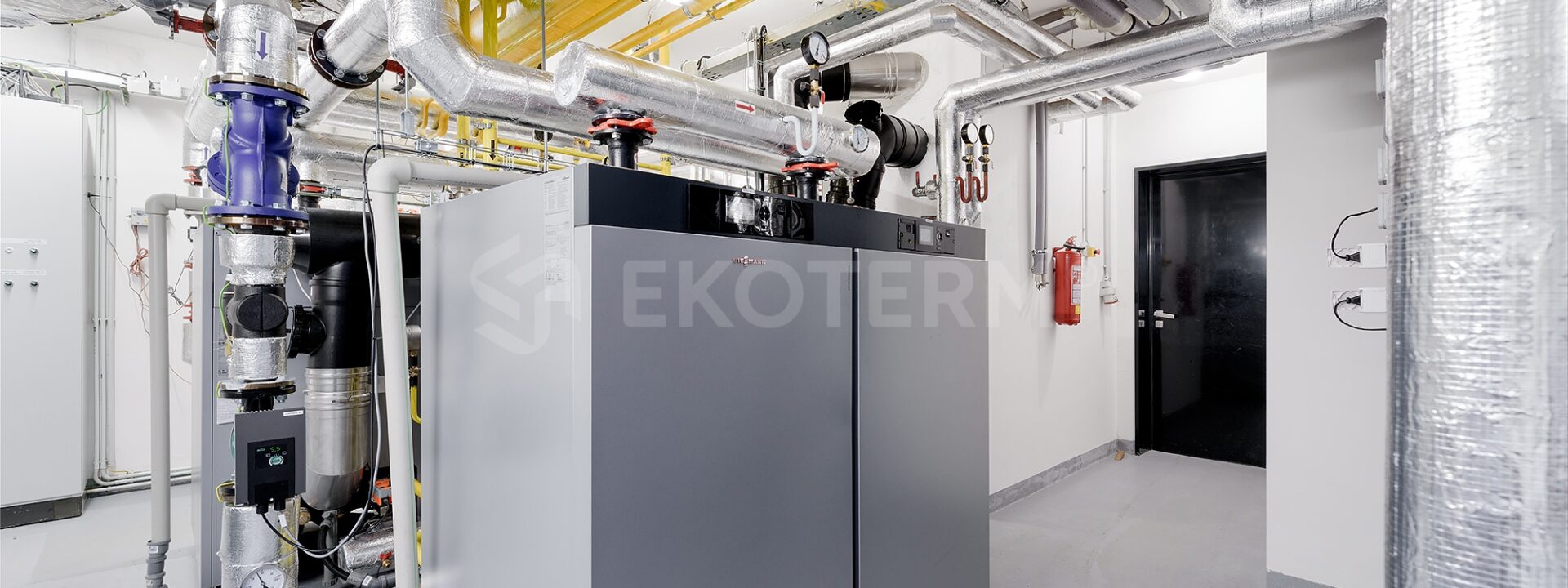 rekonstrukce kotelny 800 kW bytový dům Sacre Coeur – rozvodné potrubí v kotelně